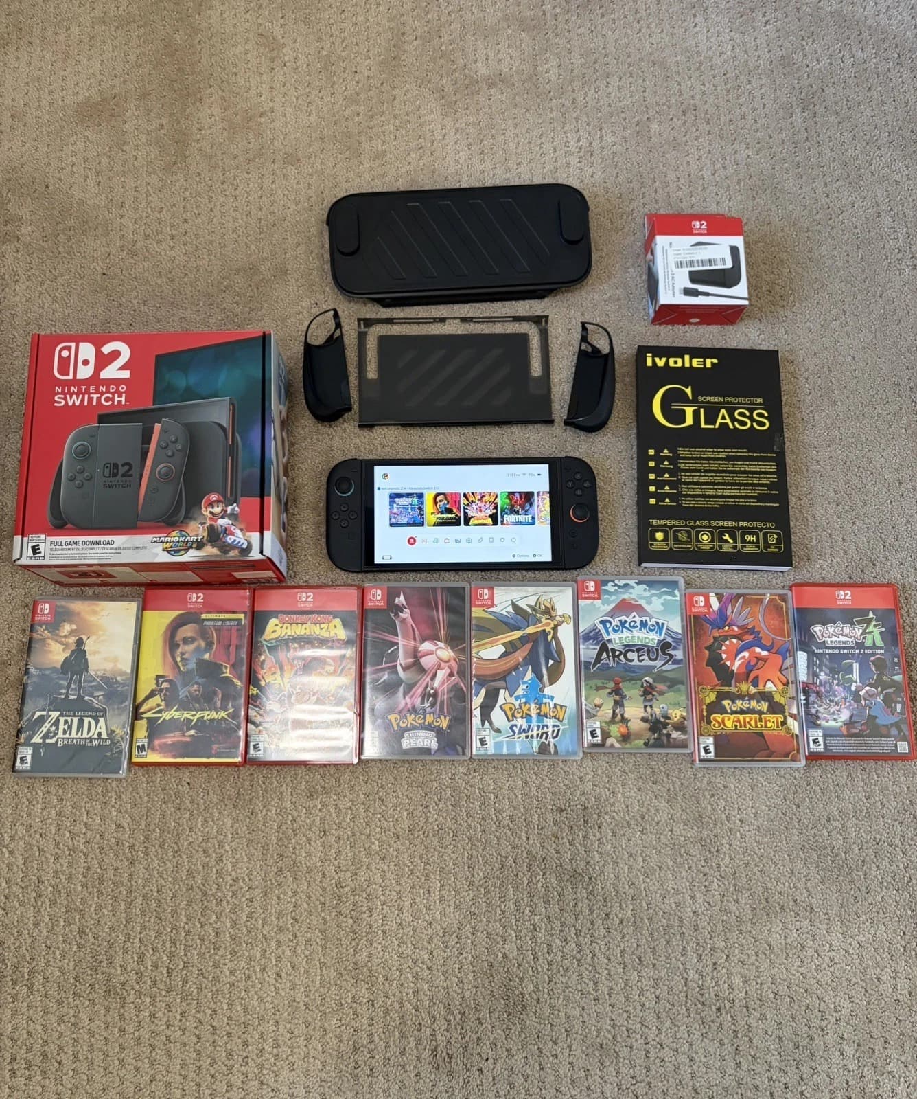 Nintendo Switch 2 With 8 Game Bundle, Extra Charger, Travel Case, And Extras. - Image 1